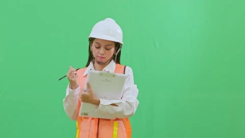 Thinking with Pen on Clipboard Analyzing Site Data Green Screen Stock-Footage 331629496