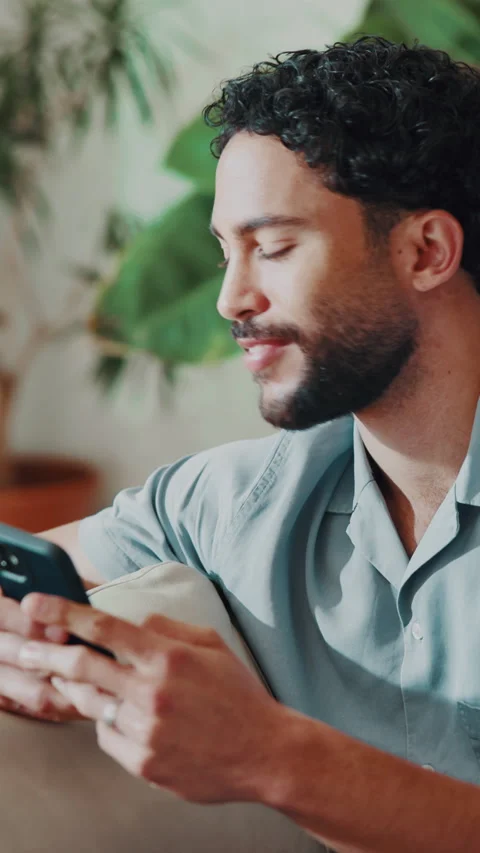 Thinking, phone and man in home with text message, online chat and notification Stock Footage 346949490