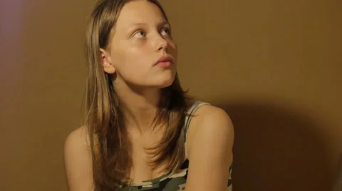 Thinking process. Teen girl thinking about something. 4K UHD Stock Footage 65148213