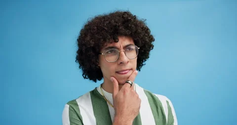 Thinking, questions and doubt with man in studio for idea, memory and why Stock Footage 294711420