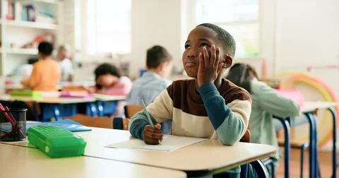 Thinking, quiz or boy in classroom for writing education, maths or solution with Stock Photos