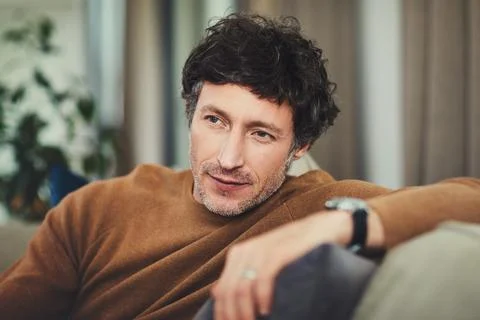 Thinking, relax or man in home with memory, chill moment or peaceful perspe.. Foto stock