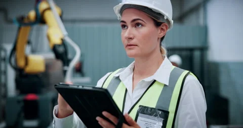 Thinking, robotics and woman on tablet in factory for assembly line, software Stock Footage 331569033