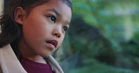 Thinking, sad and kid by window in home with reflection of trauma, bad memory Stock Footage 336702846