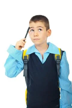 Thinking schoolboy looking up Stock Photos