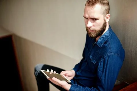Thinking, scroll and tablet with man in home for social media, reflection a.. Foto stock
