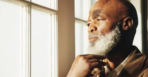 Thinking, serious or old man in house with nostalgia, wondering mindset or .. Stock Photos
