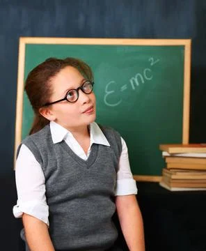 Thinking, solution and child student in classroom with idea, problem solving or Stock Photos