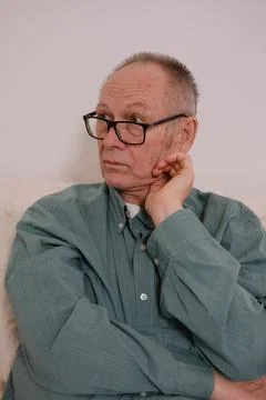 Thinking, vision and senior man in home to remember past memory, mistake and Stock Photos