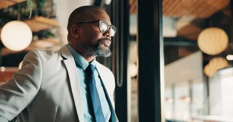 Thinking, window and black man in office with ideas, reflection or decision.. 스톡 사진