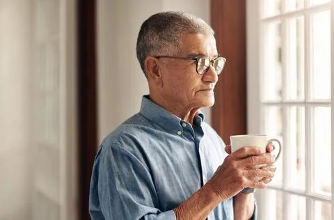 Thinking, window and senior man with coffee for reflection, thought and rem.. Stock Photos