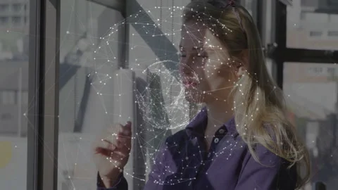 Thinking by window, woman viewing digital network animation on tablet screen Vídeo Stock 305059228