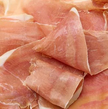 Thinly sliced dry-cured jamon or prosciutto ham. Foto stock