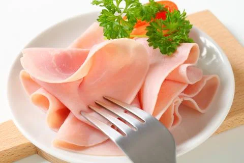 Thinly sliced ham - studio shot Stock Photos