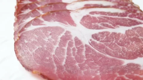 Thinly sliced jerky bacon closeup Stock Footage 131734980