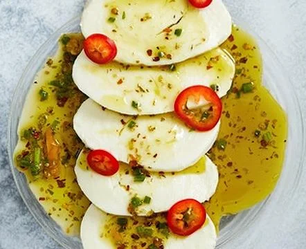Thinly sliced mozzarella cheese Stock Photos