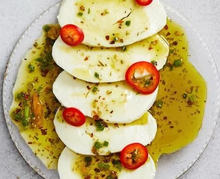 Thinly sliced mozzarella cheese Stock Photos