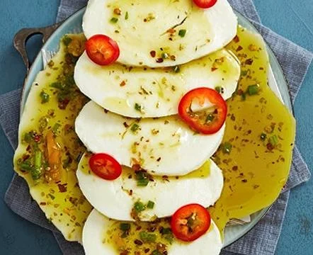 Thinly sliced mozzarella cheese Stock Photos