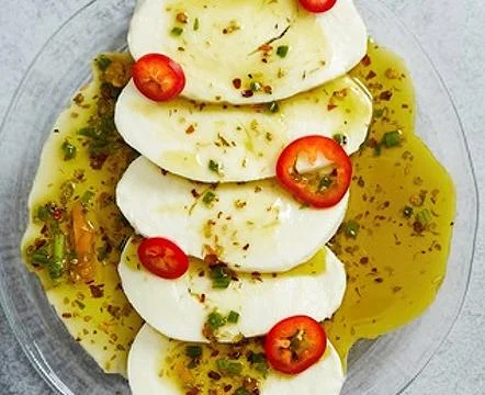Thinly sliced mozzarella cheese Stock Photos