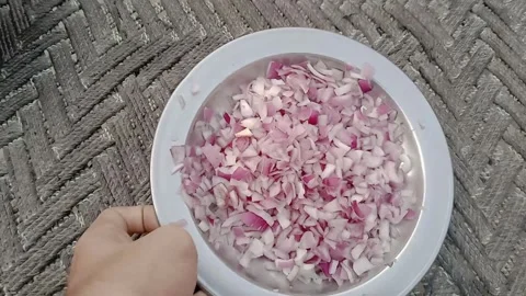 Thinly Sliced Onions Prepared for Cooking Stock Footage 346339530