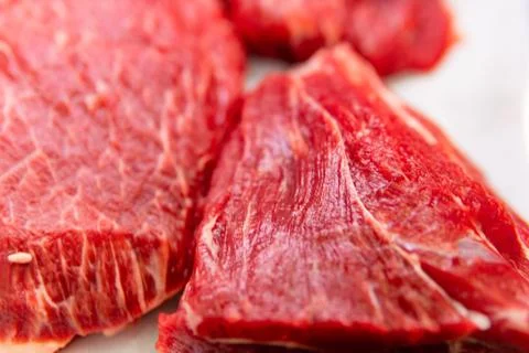 Thinly sliced raw beef meat Stock Photos