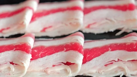 Thinly Sliced Raw Beef for Shabu Shabu Stock Footage 345686903