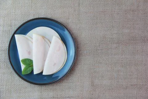 Thinly sliced round pieces of ham sausage Stock Photos