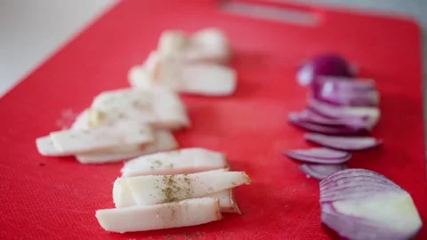 Thinly sliced white lard Red onions arranged on a cutting board. Ukrainian food Stock Footage 285519747