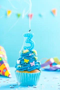 Third 3rd birthday cupcake with candle blow out.Card mockup. Stock Photos