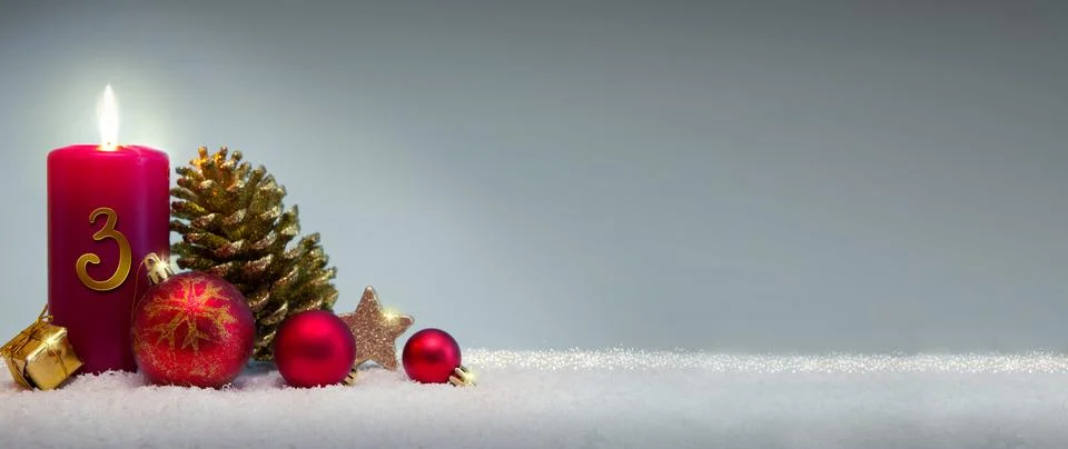 Third Advent candle with red red Christmas decoration. Stock Photos