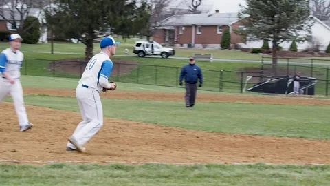 Third baseman catches a popup fly ball for the out Stock Footage 152795015