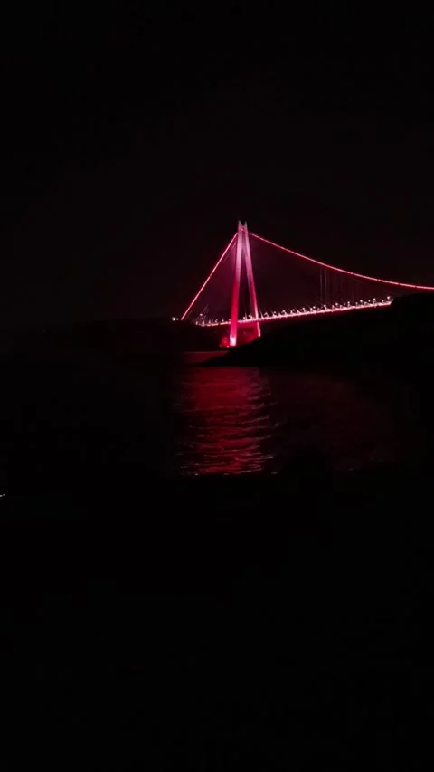 Third Bosphorus Bridge at Night with Red Reflection (Vertical) Stock Footage 337590193