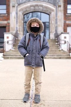 Third Grade Boy Child in Covid Face Mask Outside Elementary School Education  Stock Photos