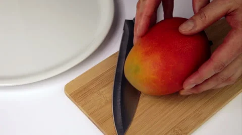 Third Of A Mango Cut Off In A First Cut Stock Footage 45440067