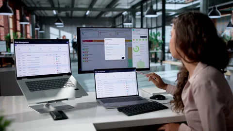 Third Party Risk Manager Analyzing Vendor Compliance On Laptop Stock Footage 336376404