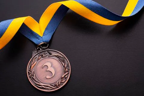 Third placed runner up bronze medal on a ribbon Stock Photos
