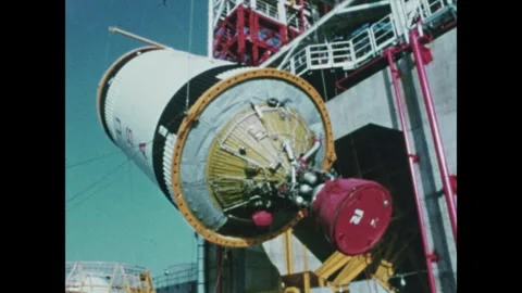 Third Stage of Apollo Saturn V launch vehicle being lowered into position Video stock 297183083