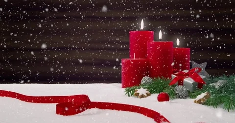 Third Sunday of Advent - Beautiful snowfall in front of a Christmas decoration Stockbeeldmateriaal 82336487