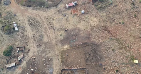 Third world subsistence farm seen from above with makeshift structures Video stock 95144708