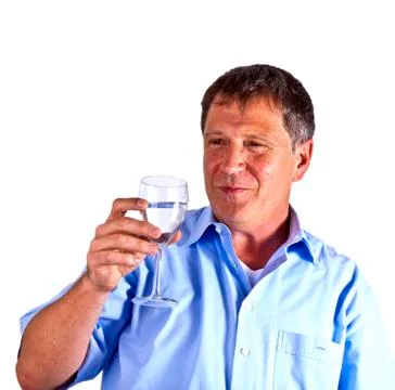 Thirsty man drinking out of a wine glass Stock Photos