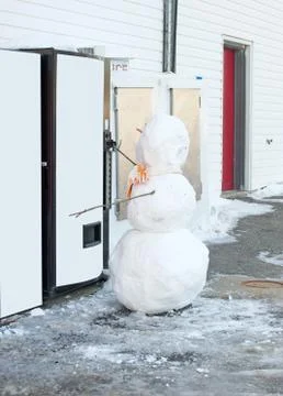 Thirsty snowman. Stock Photos
