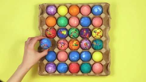 Thirty multicolored Easter eggs in egg carton box Stock Footage 171787088