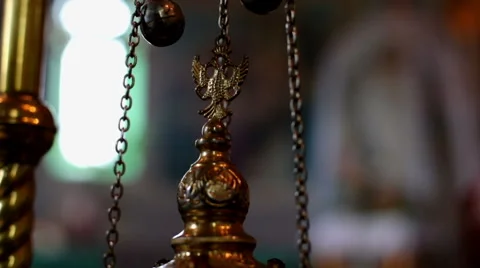 Tho-headed eagle on the top of censer. Orthodox chirch. Close-up. Video stock 56777480