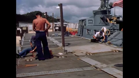 AN THOI - 1966 - Men work on a signal light and saw a signal light filter on a Stock Footage 341862687