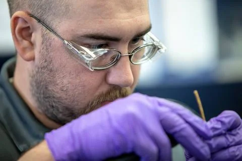 Thomas Cauvel, an intern assisting with software/electrical engineering on... 写真素材
