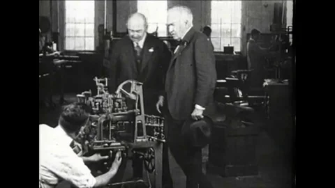Thomas Edison admires a new lightbulb factory in 1919. Stock Footage 126048541