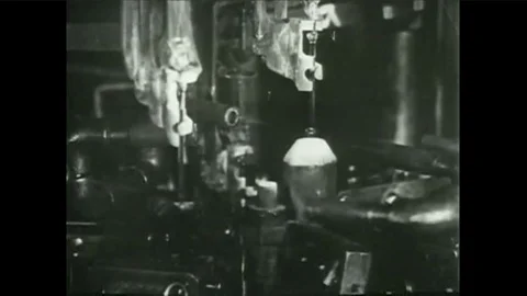 Thomas Edison in his light bulb factory, 1922. Video stock 101245857