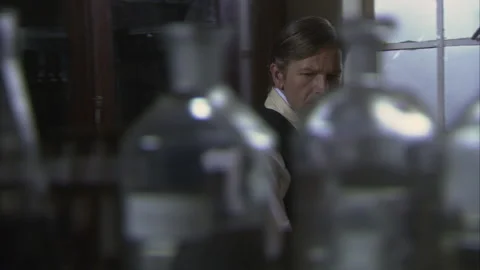 Thomas Edison walking around in his laboratory, 1879 - Reenactment Stock Footage 202899455
