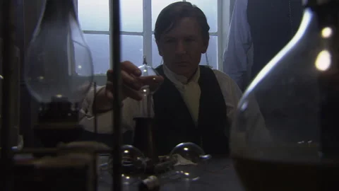 Thomas Edison working in laboratory in 1879 - Reenactment Stock Footage 202899510
