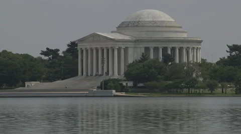 Thomas Jefferson Memorial over the Tidal Basin - Couple in Paddle Boat Stock Footage 47055529